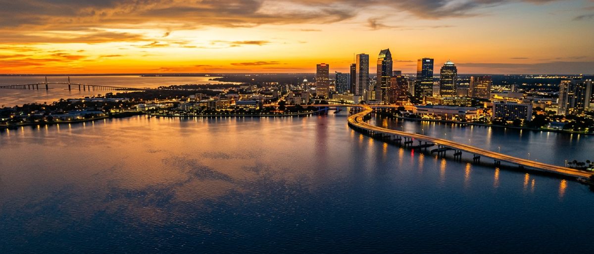 Tampa Bay skyline at sunset - the real estate investment market HomeProp's portfolio analytics know inside and out